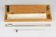 two thermometers in wooden case