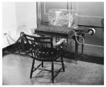 Mark I control station, tape roll, and tape feeding mechanism.