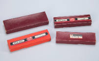 4 compasses in original boxes