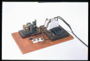 transformer with knife switch, electromagnet, and key